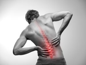 man showing back pain - in need of relief gel