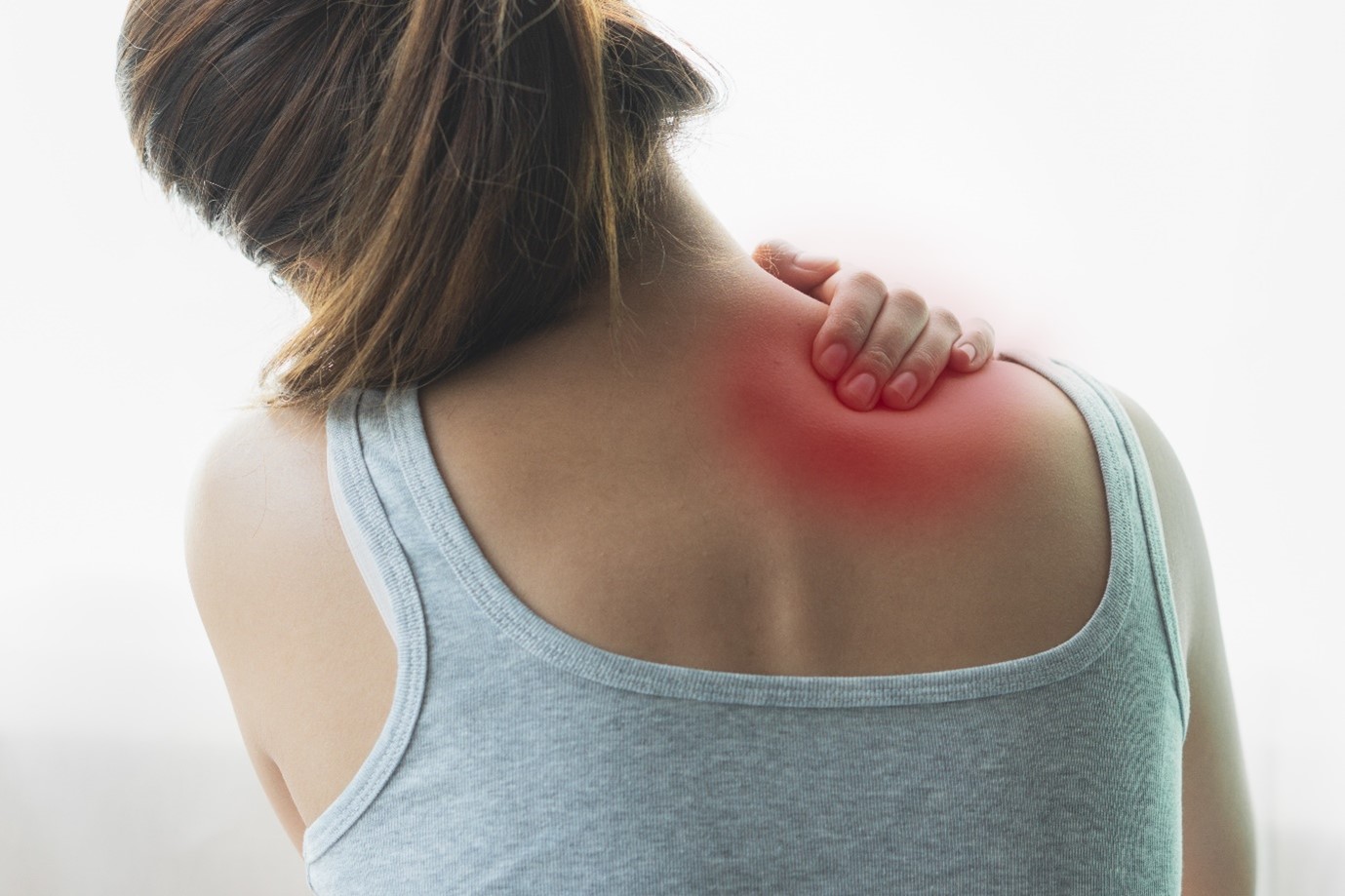 woman showing shoulder pain